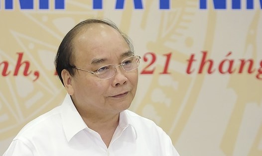 Thủ tướng Nguyễn Xuân Phúc phát biểu chỉ đạo trong buổi làm việc với lãnh đạo chủ chốt tỉnh Tây Ninh sáng 21.8. Ảnh: VGP
