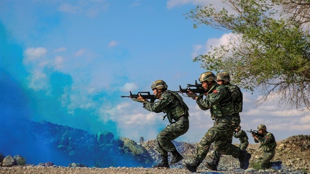 Trung Quốc sẵn sàng điều quân đến Syria chiến đấu bên cạnh lực lượng của Tổng thống Bashar al-Assad. Ảnh: China Stringer Network