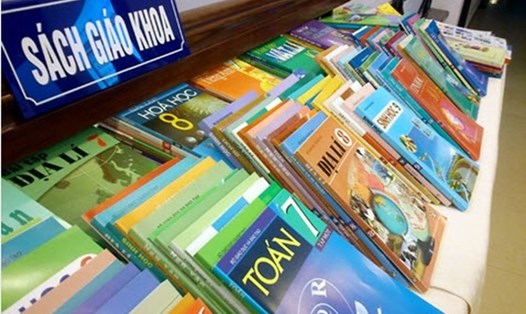 Bộ Giáo dục và Đào tạo cho biết sẽ khắc phục việc học sinh viết vào sách giáo khoa, tránh gây lãng phí. Ảnh: Hải Nguyễn