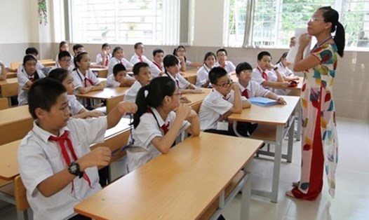 Theo chương trình giáo dục phổ thông mới, học sinh tiểu học phải học 2 buổi/ngày hoặc 6 buổi/tuần. Ảnh minh họa: Hải Nguyễn