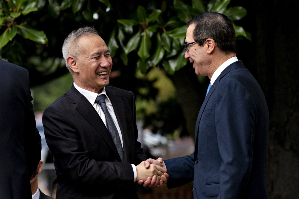 Mỹ và Trung Quốc đã đạt được thỏa thuận thương mại giai đoạn một sau vòng đàm phán mới nhất ở Washington. Ảnh: Bloomberg.