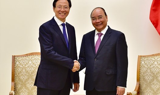 Thủ tướng Nguyễn Xuân Phúc tiếp Bộ trưởng Bộ Nông nghiệp, Nông thôn Trung Quốc Hàn Trường Phú. Ảnh: VGP.
