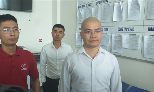 Nguyễn Thái Luyện trong một lần tới làm việc với cơ quan chức năng tỉnh Bà Rịa - Vũng Tàu (áo trắng, góc phải). Ảnh: CTV