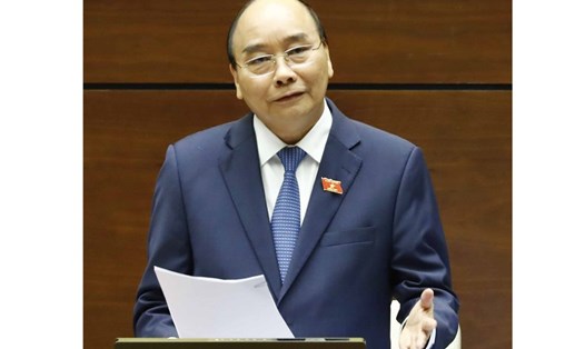 Thủ tướng Chính phủ Nguyễn Xuân Phúc cùng 4 Bộ trưởng trả lời chất vấn tại kỳ họp thứ 8 QH khóa XIV. Ảnh: TTXVN