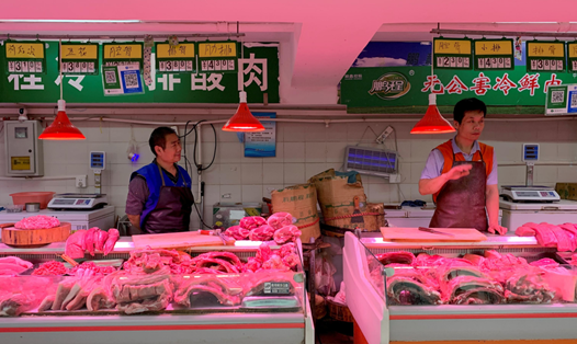 Trung Quốc sẽ miễn thuế sản phẩm thịt lợn và đậu nành của Mỹ. Ảnh: N.N