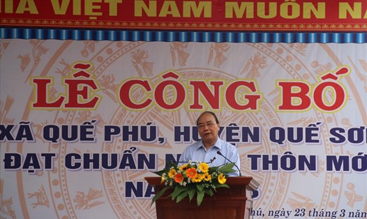 Thủ tướng Chính phủ Nguyễn Xuân Phúc dự buổi lễ xã Quế Phú được công nhận đạt chuẩn nông thôn mới. Ảnh: Đ.V 