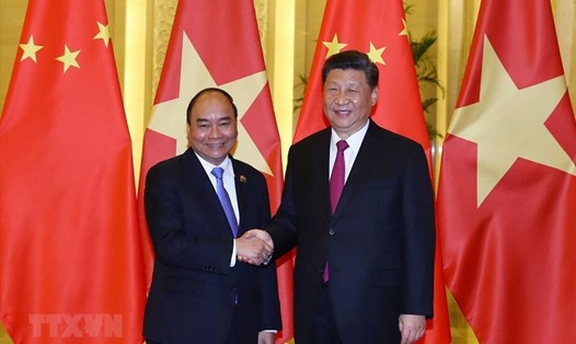 Thủ tướng Nguyễn Xuân Phúc hội kiến Tổng Bí thư, Chủ tịch Trung Quốc Tập Cận Bình. Ảnh: TTXVN. 