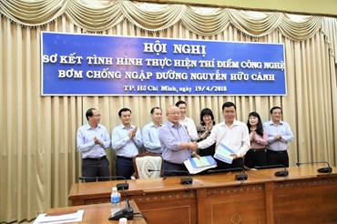 Gần 1 năm sau khi hợp đồng chính thức được ký, giá thuê dịch vụ chống ngập giữa TPHCM và Cty Quang Trung mới được chốt giá chính thức. Ảnh: Tư liệu/Trường Sơn