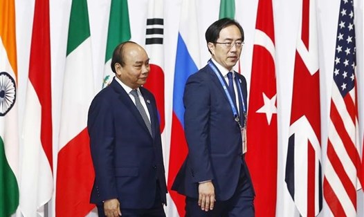 Lễ đón Thủ tướng Nguyễn Xuân Phúc dự Hội nghị thượng đỉnh G20. Ảnh: TTXVN.