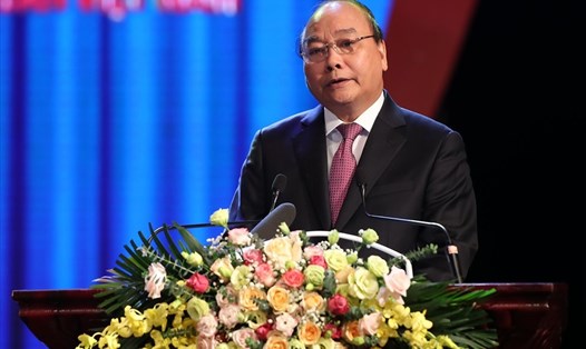 Thủ tướng Nguyễn Xuân Phúc phát biểu tại buổi lễ kỷ niệm 90 năm Ngày thành lập Công đoàn Việt Nam. Ảnh: Sơn Tùng.