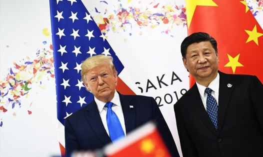 Tổng thống Donald Trump và Chủ tịch Tập Cận Bình bên lề hội nghị G20 ở Osaka, Nhật Bản đã nhất trí nối lại đàm phán thương mại Mỹ - Trung. Ảnh: AFP
