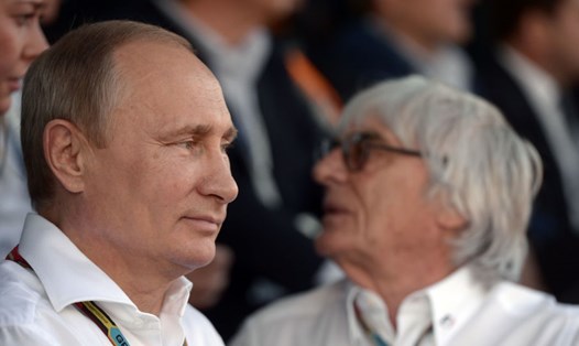 Tổng thống Nga Vladimir Putin và tỉ phú Bernie Ecclestone tại giải vô địch F1 ở Sochi, Nga năm 2014. Ảnh: Sputnik