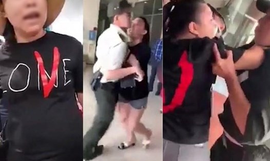 Cảnh nữ đại úy công an chửi bới, xô đẩy nhân viên sân bay gây náo loạn được cắt từ clip trên mạng xã hội. Ảnh: FB