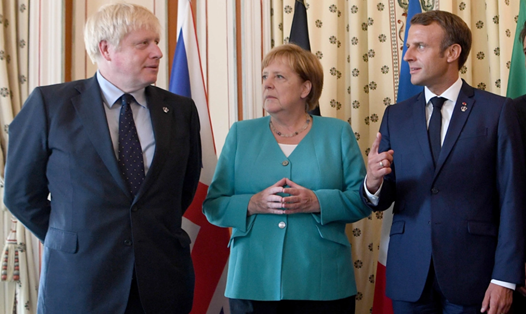 Từ trái qua phải: Thủ tướng Anh Boris Johnson, Thủ tướng Đức Angela Merkel và Tổng thống Pháp Emmanuel Macron tại hội nghị thượng đỉnh G7 ở Pháp. Ảnh: Reuters