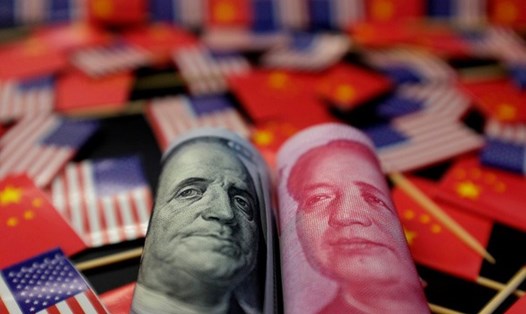 Tỷ giá ngoại tệ hôm nay 7.8: Mỹ  gọi Trung Quốc là quốc gia thao túng tiền tệ, giới phân tích lo ngại hai nền kinh tế lớn nhất thế giới đang chuyển sang chiến tranh tiền tệ. Ảnh Reuters