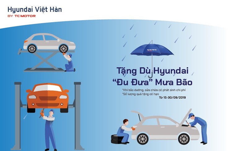 Tặng dù Hyundai – “đu đưa” mưa bão