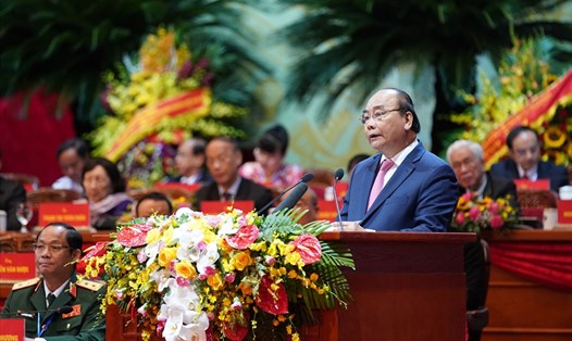 Thủ tướng Nguyễn Xuân Phúc phát biểu tại lễ khai mạc Đại hội đại biểu toàn quốc Mặt trận Tổ quốc Việt Nam lần thứ IX, sáng 19.9. Ảnh: Quang Hiếu