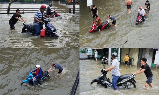 Nhóm 3 thanh niên đẩy xe máy ngập nước cho người dân trên đường Trần Xuân Soạn (quận 7, TPHCM).  Ảnh: M.Q