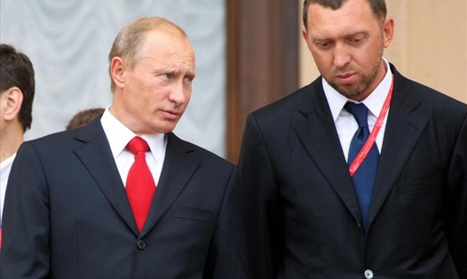 Tổng thống Nga Vladimir Putin và nhà tài phiệt Oleg Deripaska. Ảnh: Getty Images