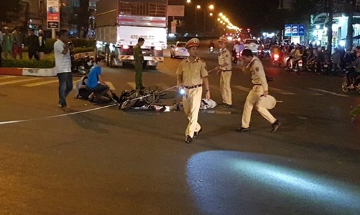 Cảnh sát giao thông Bình Phước xử lý tai nạn trên quốc lộ 14. Ảnh: ĐT