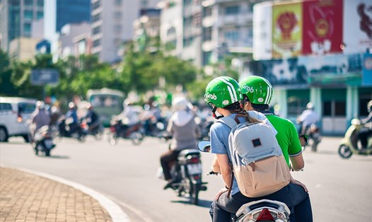 Việt Nam là một trong những thị trường có dịch vụ xe ôm công nghệ trong khu vực Đông Nam Á, chính là một mô hình kinh doanh mới thông qua ứng dụng số hóa . Ảnh: PK