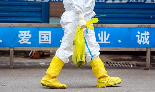 Trung Quốc đã đưa ra các biện pháp nhằm ngăn chặn sự lây lan của virus Corona. Ảnh: The Guardian.