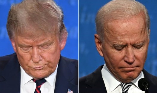 Tổng thống Donald Trump (trái) và ứng viên Joe Biden trong cuộc tranh luận bầu cử Mỹ đầu tiên hôm 29.9. Ảnh: AFP.
