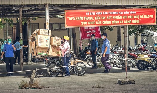 Dịch COVID-19 ảnh hưởng nghiêm trọng đến doanh nghiệp và người lao động ở Đà Nẵng. Ảnh: Tường Minh