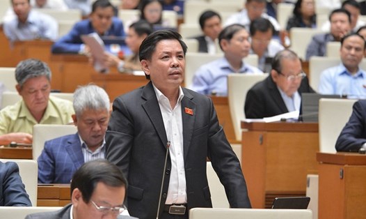 Bộ trưởng Bộ Giao thông Vận tải Nguyễn Văn Thể trả lời chất vấn của các đại biểu Quốc hội. Ảnh: Quốc hội