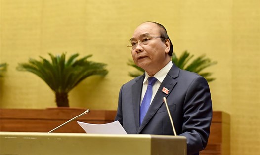 Thủ tướng Chính phủ Nguyễn Xuân Phúc làm rõ thêm một số vấn đề liên quan thuộc trách nhiệm của Chính phủ và trực tiếp trả lời chất vấn của đại biểu Quốc hội. Ảnh Nhật Bắc