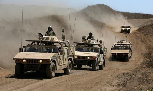 Các phương tiện quân sự của Israel ở Cao nguyên Golan trên biên giới với Syria trong một cuộc diễn tập. Ảnh: AFP.