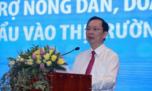 Phó Thống đốc Thường trực Ngân hàng Nhà nước Đào Minh Tú phát biểu tại 
hội thảo. Ảnh: Tô Thế