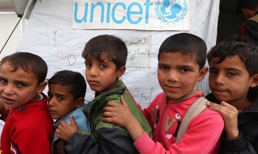 UNICEF cho biết sẽ chuyển 2 tỉ liều vaccine COVID-19 tới các nước nghèo vào năm 2021. Ảnh: AFP