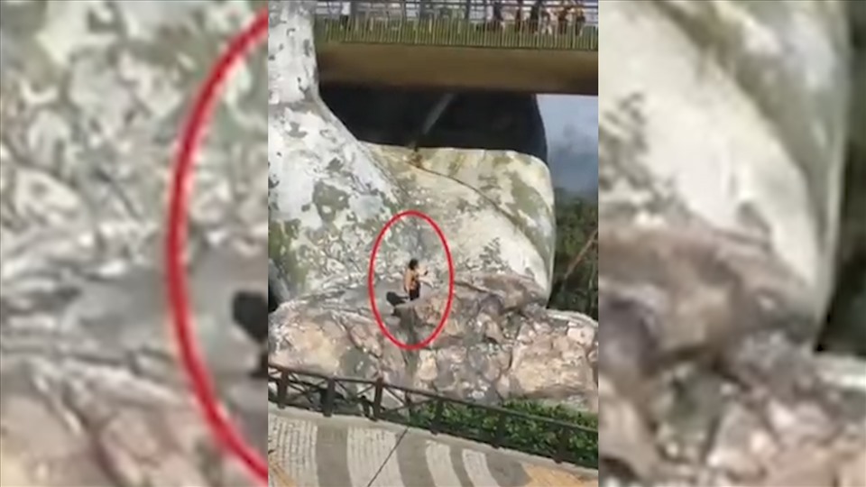 Người phụ nữ liều mình lẻo ra bàn tay khổng lồ để chụp ảnh tự sướng.