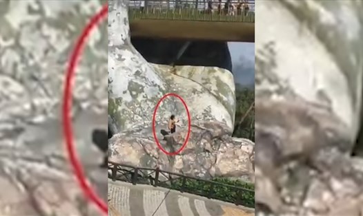 Người phụ nữ liều mình lẻo ra bàn tay khổng lồ để chụp ảnh tự sướng.