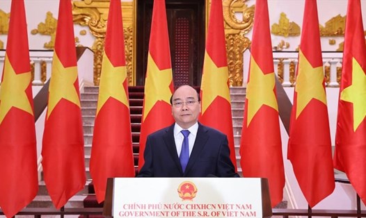 Thủ tướng Nguyễn Xuân Phúc ghi hình phát biểu chúc mừng Hội chợ Trung Quốc - ASEAN lần thứ 17. Ảnh: BNG