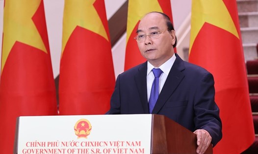Thủ tướng Nguyễn Xuân Phúc ghi hình phát biểu chúc mừng Hội chợ Trung Quốc - ASEAN lần thứ 17. Ảnh: BNG.