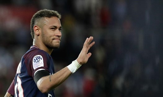 Đang hạnh phúc tại PSG, hẳn Neymar cũng không muốn trở lại Barca đang rối ren như lúc này. Ảnh: AFP