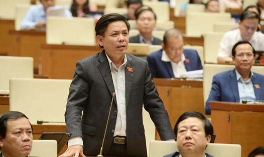 Bộ trưởng Bộ Giao thông vận tải Nguyễn Văn Thể trả lời chất vấn của các đại biểu Quốc hội. Ảnh: TTBC