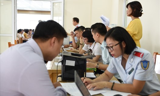 Đoàn liên ngành của Hà Nội thanh kiểm tra doanh nghiệp về việc thực hiện chính sách BHXH, BHYT. Ảnh: BHXHHN