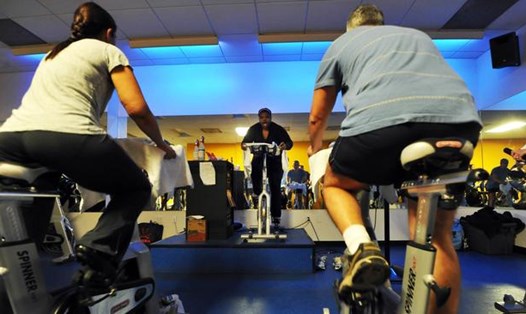 Vận động thường xuyên sẽ giúp giảm béo, giảm mỡ bụng. Ảnh AFP