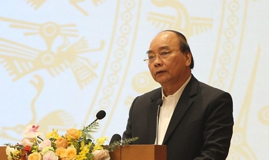Thủ tướng Chính phủ Nguyễn Xuân Phúc phát biểu tại Hội nghị trực tuyến toàn quốc về công tác giảm nghèo. Ảnh T.Vương