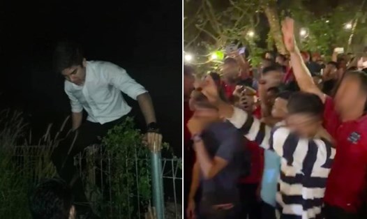 Bộ trưởng trẻ nhất Malaysia phải trèo rào để thoát khỏi đám đông quá khích. Ảnh: AO.