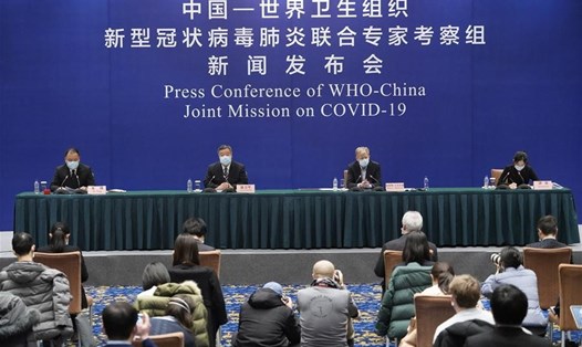 Nhóm chuyên gia WHO và Trung Quốc đánh giá Trung Quốc có thành quả trong ngăn chặn COVID-19 lây lan từ người sang người. Ảnh: Tân Hoa Xã.