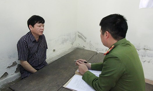 Đối tượng Nguyễn Lê Hải tại cơ quan điều tra. Ảnh: MT