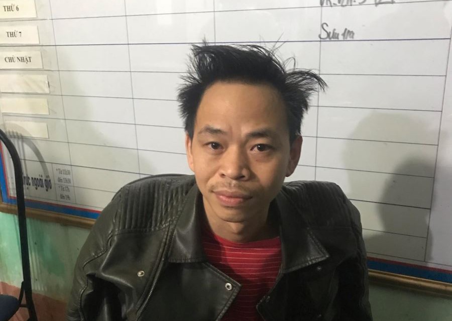 Đối tượng Nguyễn Đức Tâm tại cơ quan công an. Ảnh: CACC