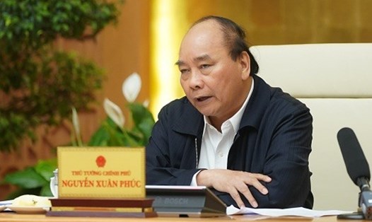 Thủ tướng Nguyễn Xuân Phúc chủ trì cuộc họp Thường trực Chính phủ về giải pháp bình ổn giá thịt lợn - Ảnh: VGP/Quang Hiếu