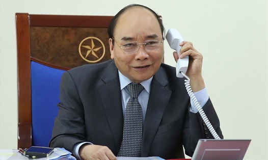 Thủ tướng Nguyễn Xuân Phúc điện đàm với Thủ tướng Lào, Campuchia ngày 26.3. Ảnh: TTXVN