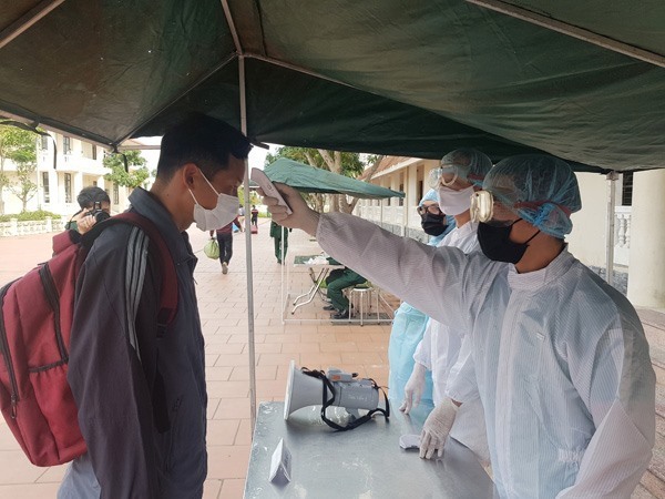 Nghệ An diễn tập tình huống đón người dân về từ vùng dịch để cách ly. Ảnh: TT