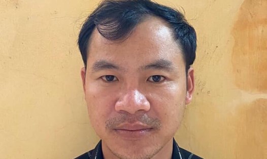 Đối tượng Nguyễn Quang Trung tại cơ quan điều tra. Ảnh: CACC